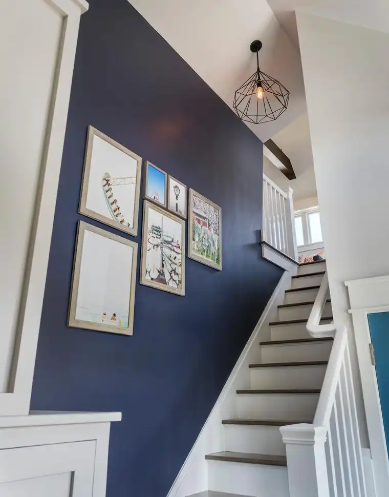 This old classic shingle-style home - staircase wall art