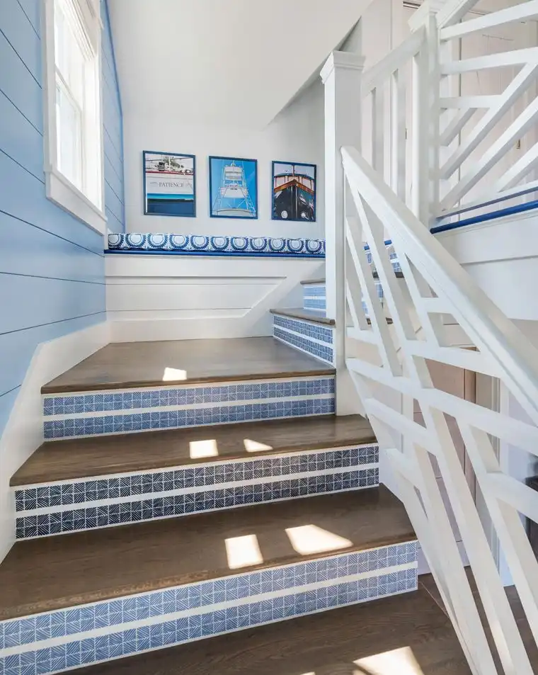This old classic shingle-style home - stairs steps with blue tiles