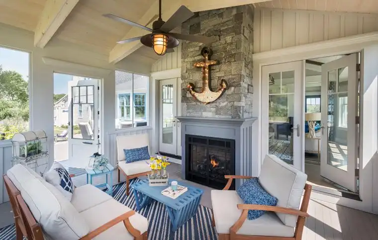 This old classic shingle-style home - sunroom fireplace