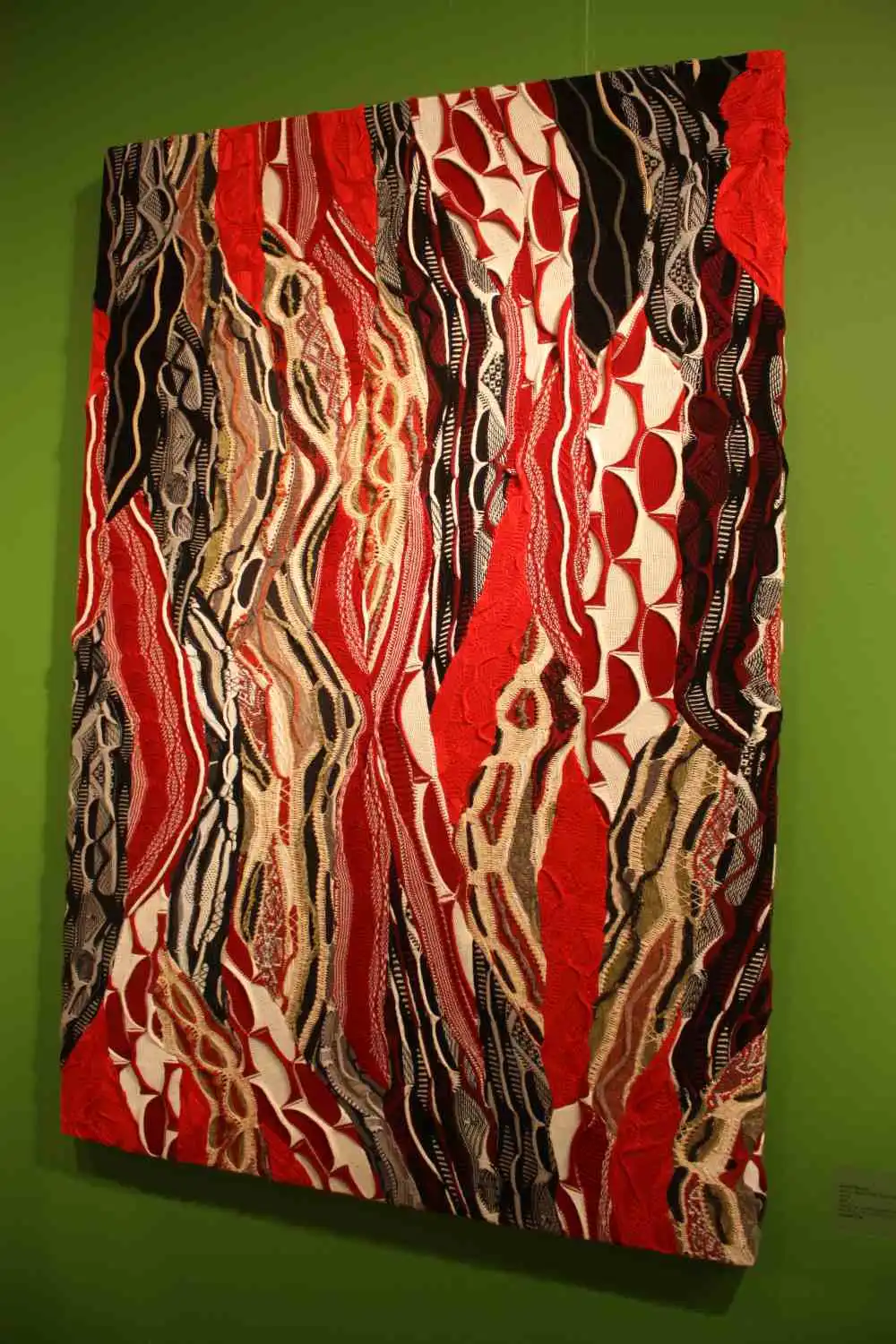 This pieces uses a Coogi sweater popular in the 1980s and 1990s