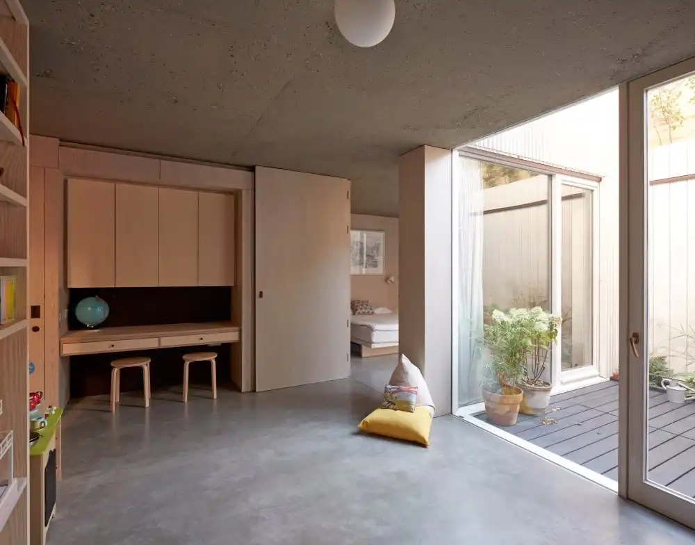 Tikari Works has built a half subterranean home design