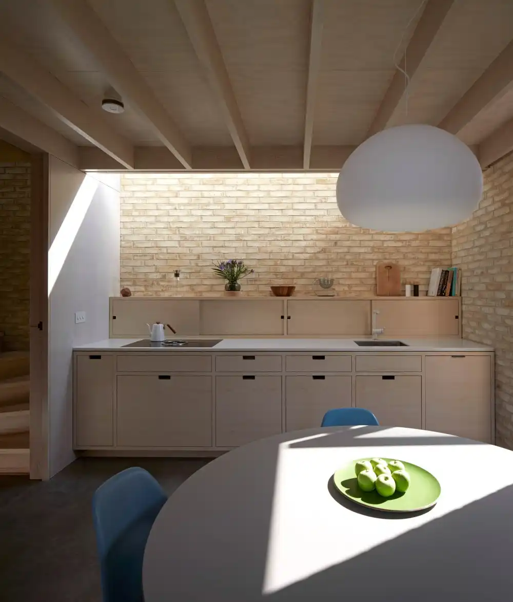 Tikari Works has built a half subterranean home kitchen