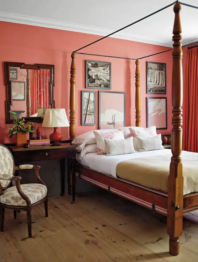 Traditional bedroom with coral wall paint