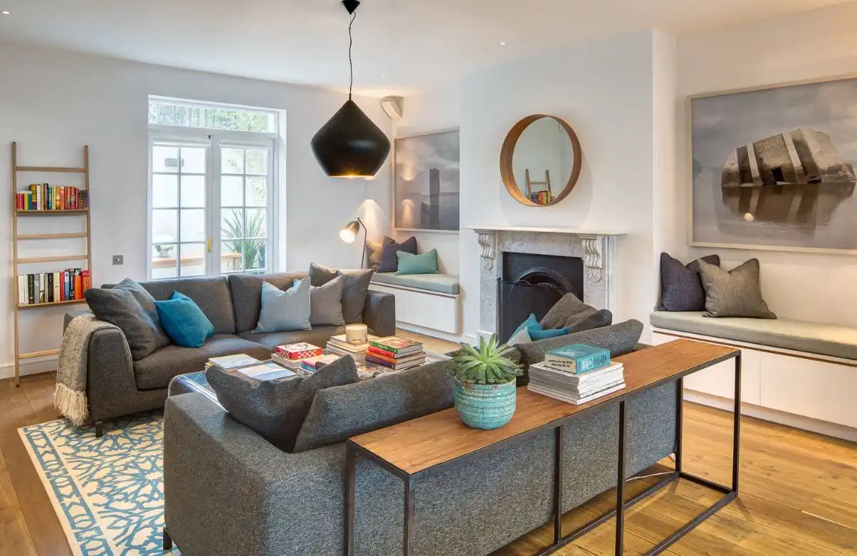 Traditional living room with upholstered sofa and table behind