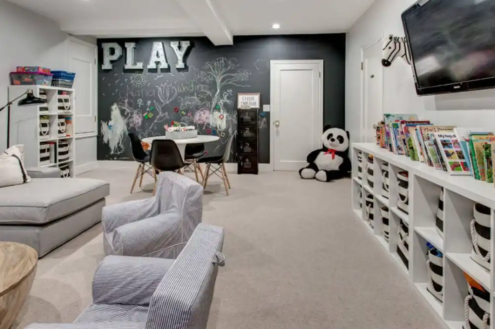 Transitional gender neutral carpeted and gray floor kids room