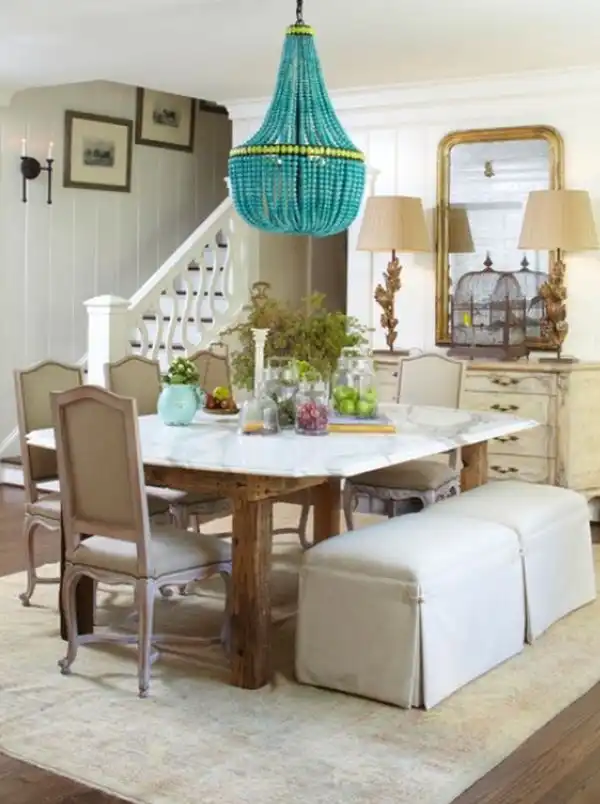 Turquoise beaded chandelier and marble top dining table