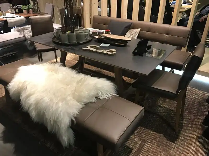 Two different benches for dining table area