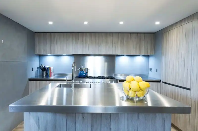 Industrial-style kitchen with stainless steel countertops