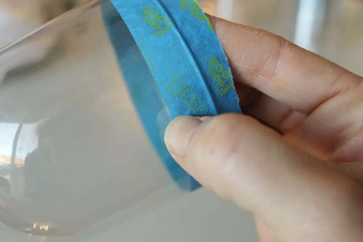 Use your fingernail to secure the edge
