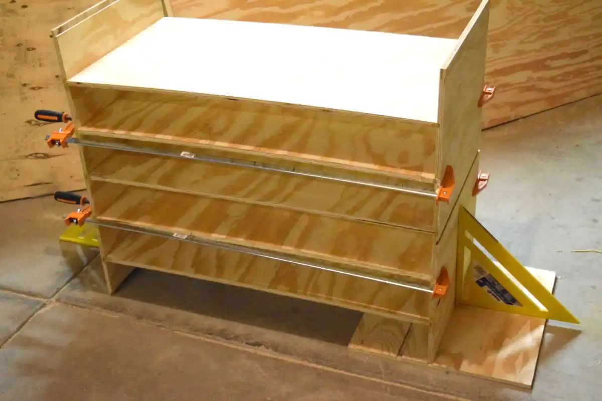 Using clamps to connect shoe rack