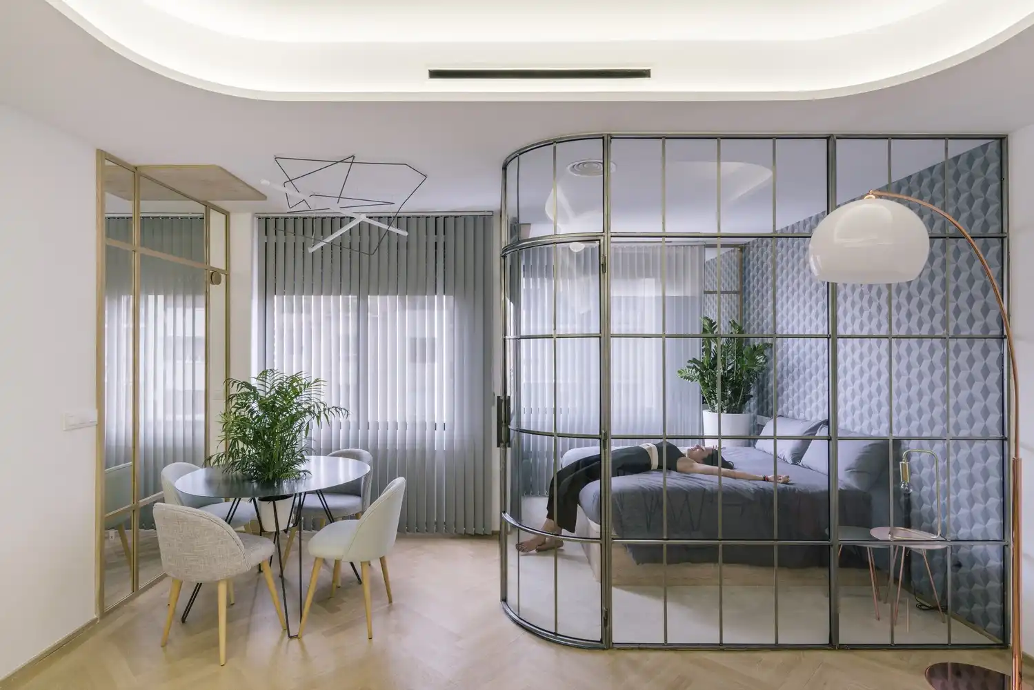 Glass Walls and Lots of Curves Distinguish Luxury Madrid Apartment Renovation