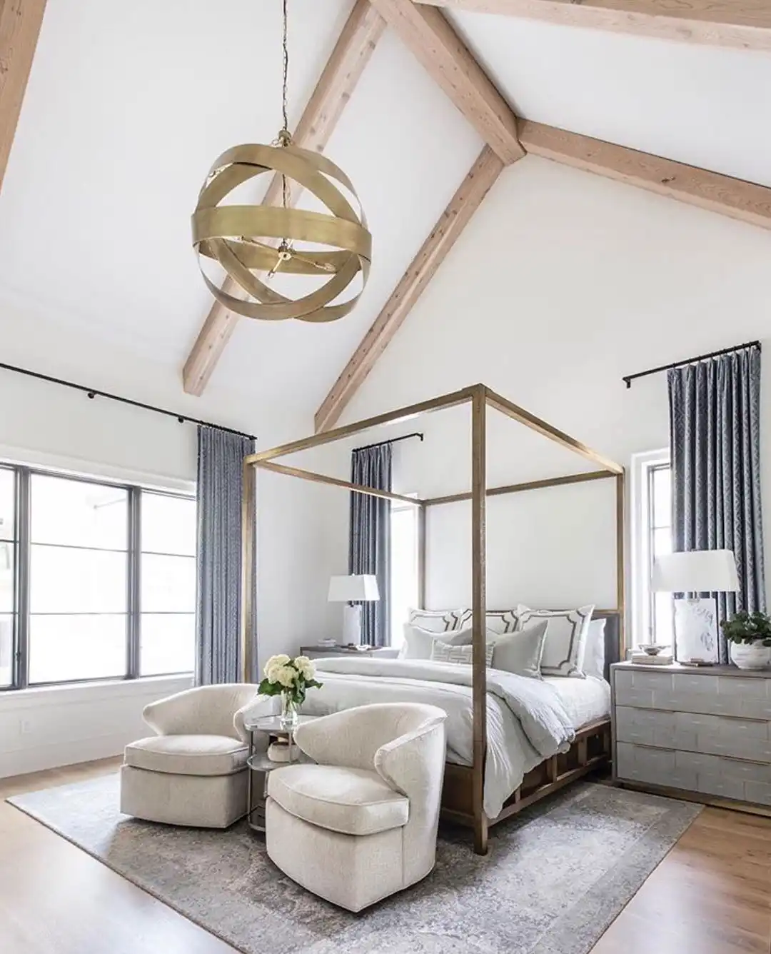 Gold Canopy Bed And High Ceilings