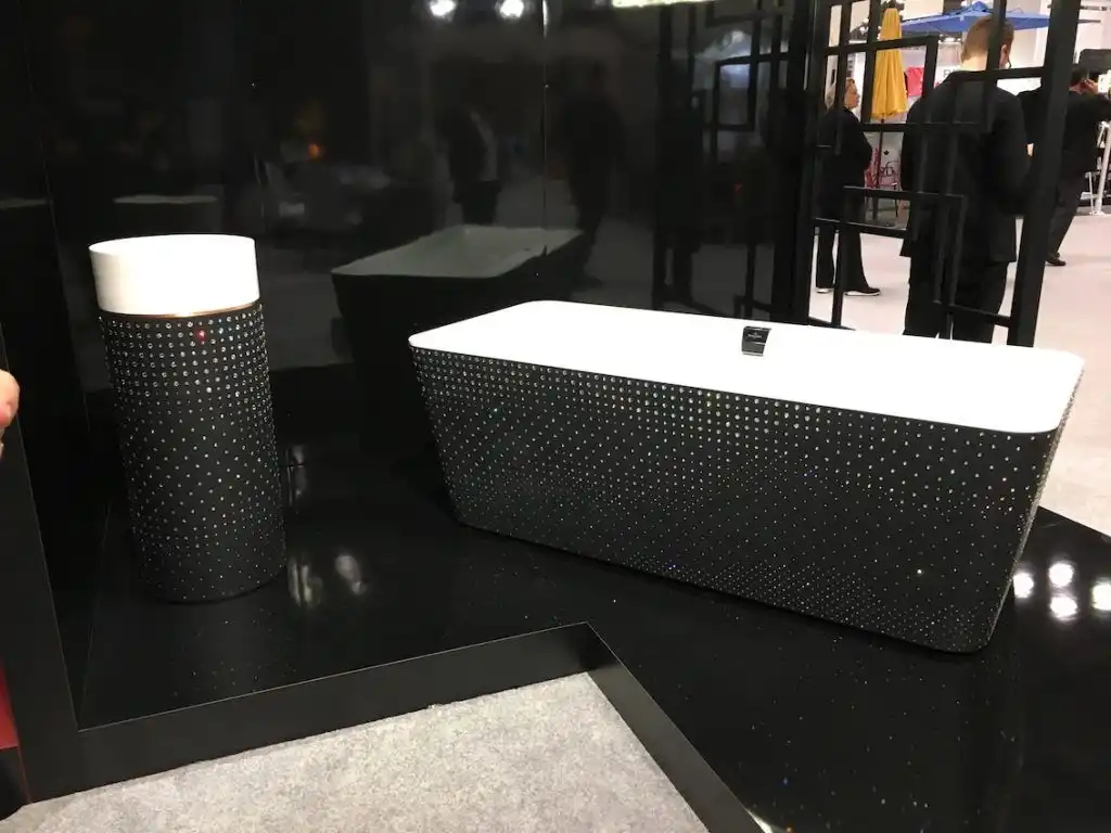 Dark and dramatic doesn't begin to describe the impression that this luxe tub or sink will make.