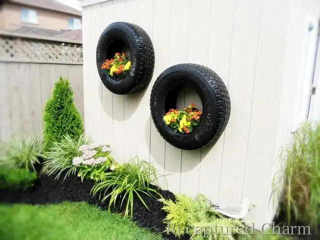 Wall old tires turned into planters