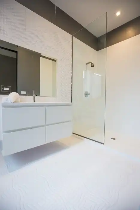 Wave House bathroom with open shower