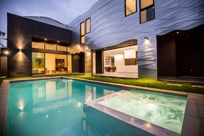 Wave House wraped around the pool