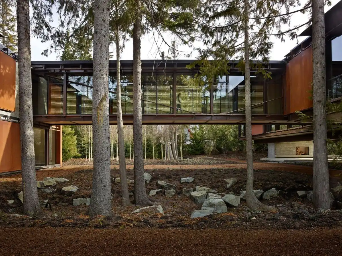 The glass bridge links the two sections of the house.