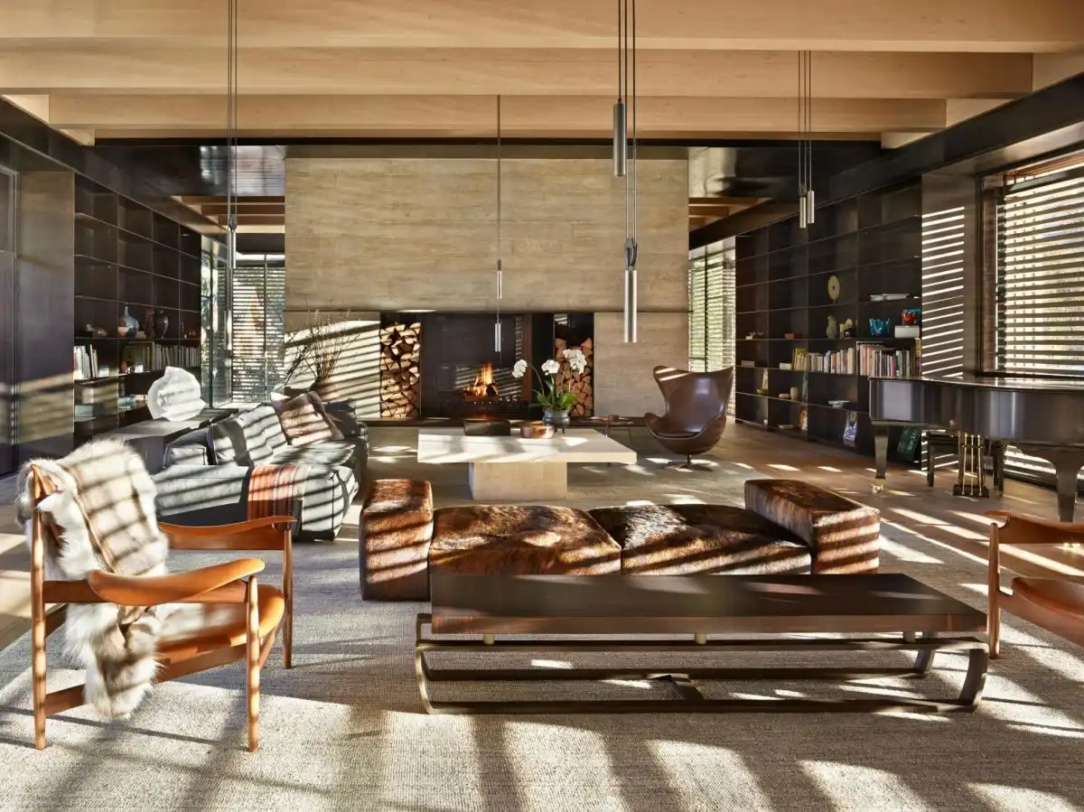 Whistler Ski House Olson Kunding Cabin concrete fireplace and iconic egg chair