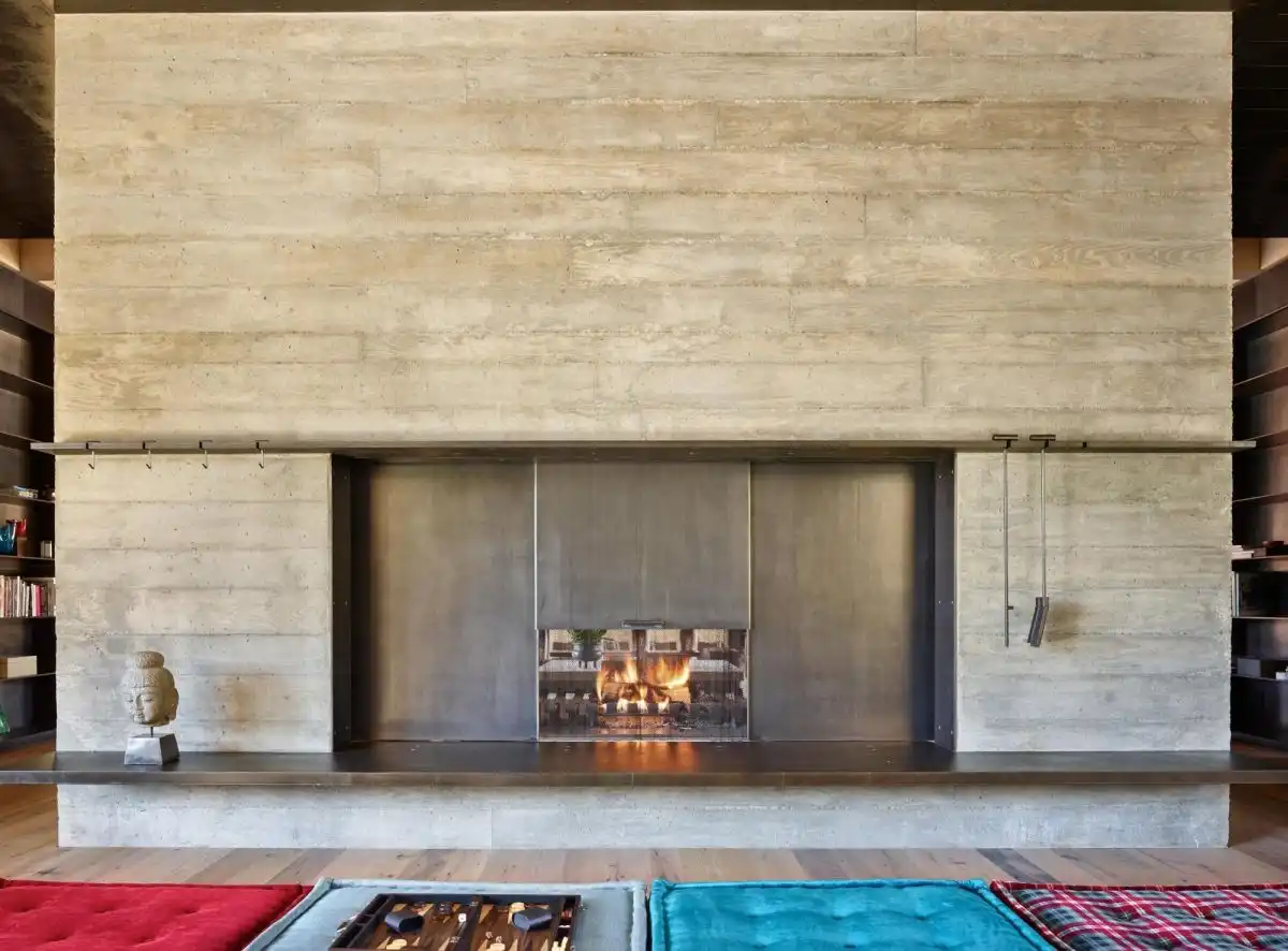 A panel can be lowered to make the fireplace opening even smaller.