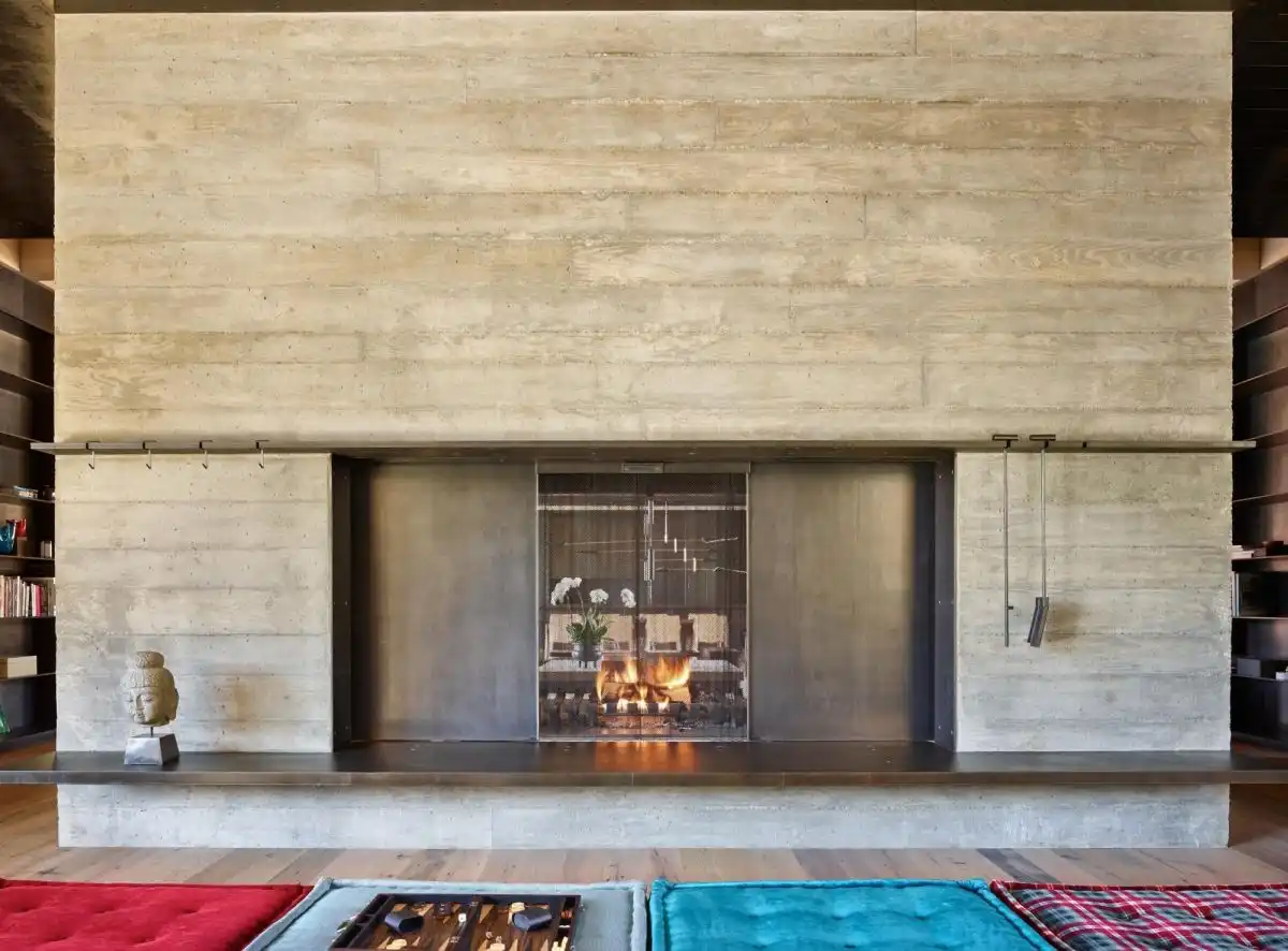Moving panels adjust the size of the fireplace opening.