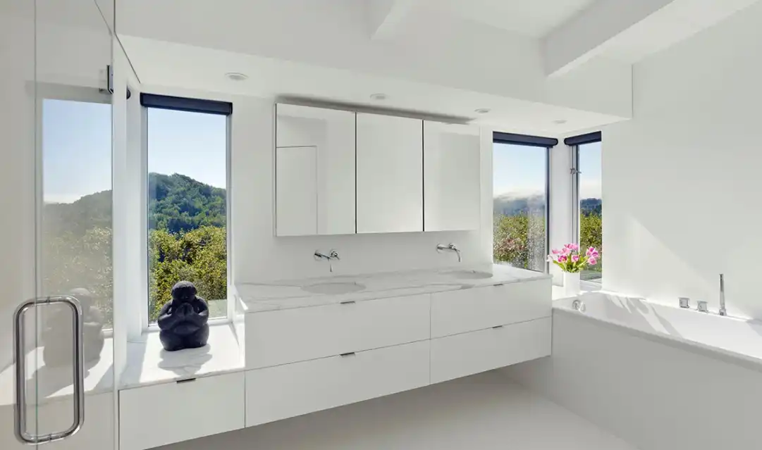 White bathroom with large windows