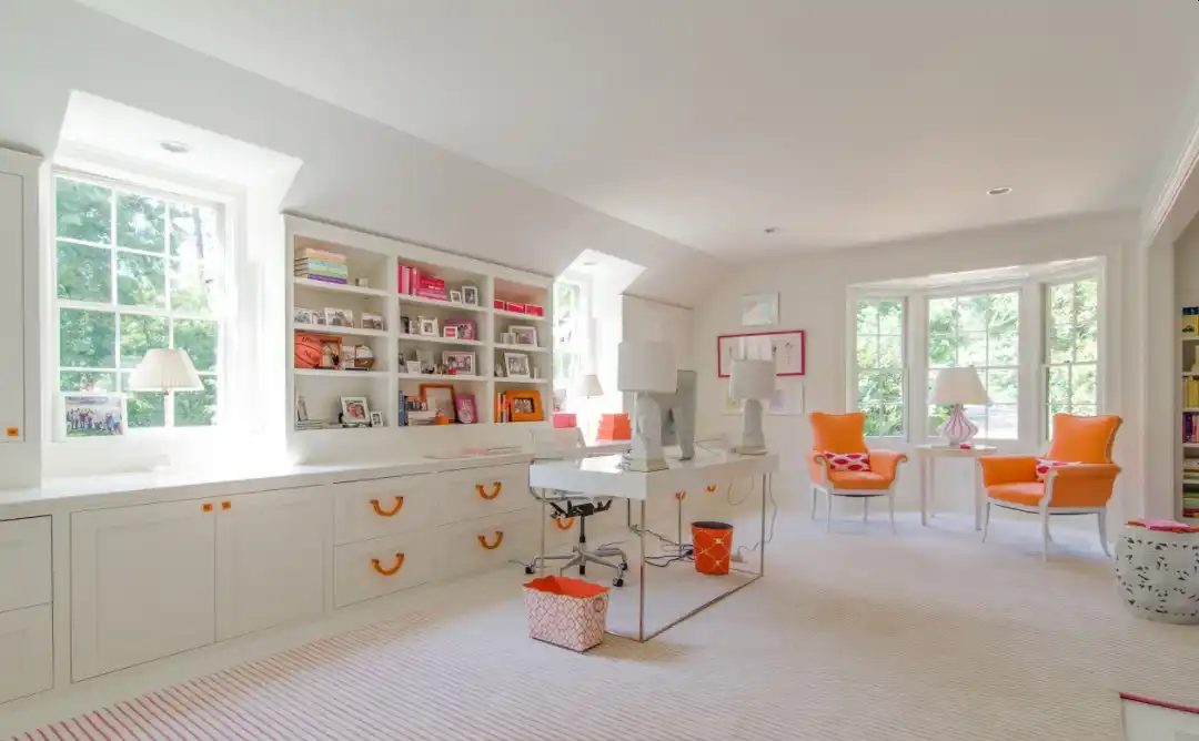 White decor with pops of orange