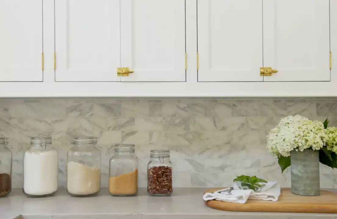 Brass hardware On White Cabinets