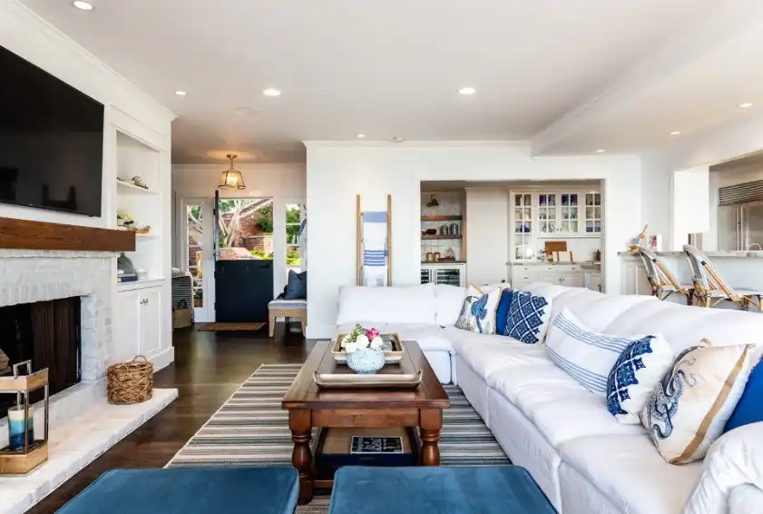 White living room with breezy blue accents