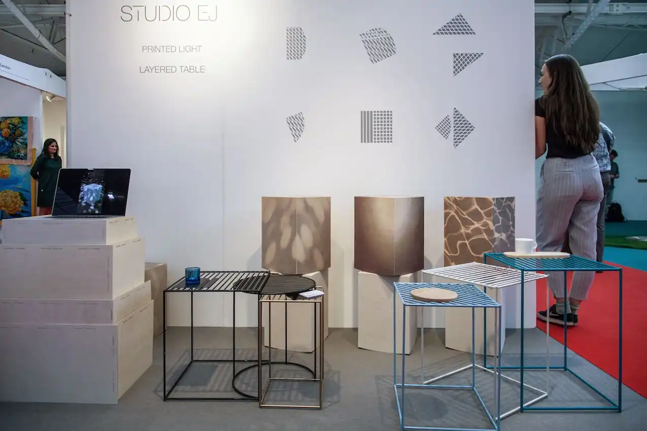 Studio EJ's Layered Tables are avail;able in aluminum and wood.