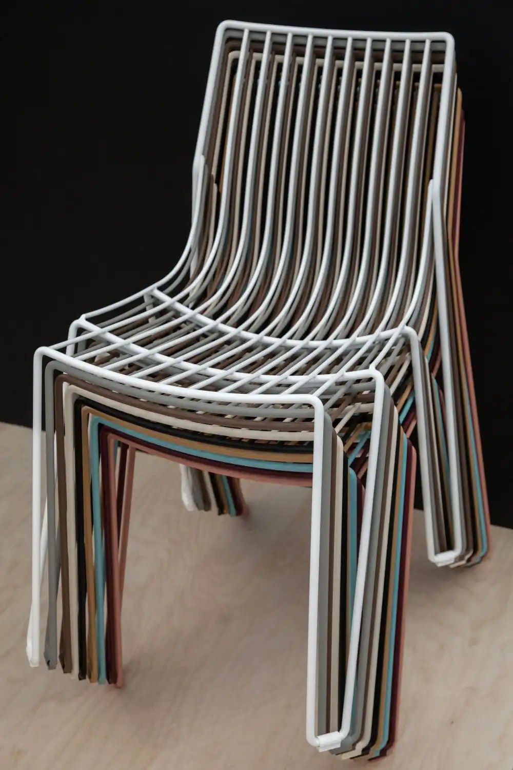 Wire stackable chairs in different colors