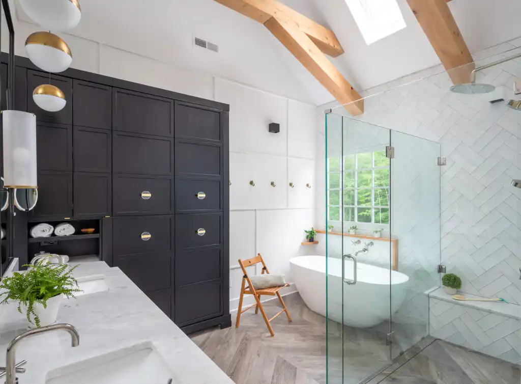 white bathroom with black cabinets wooden beams