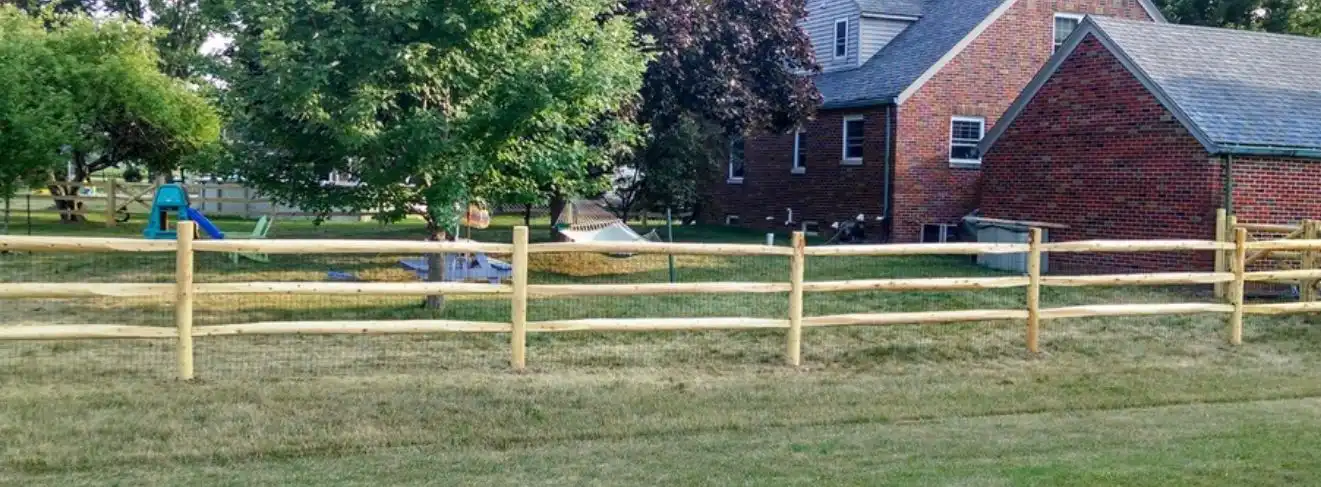 Wood logs split rail fence