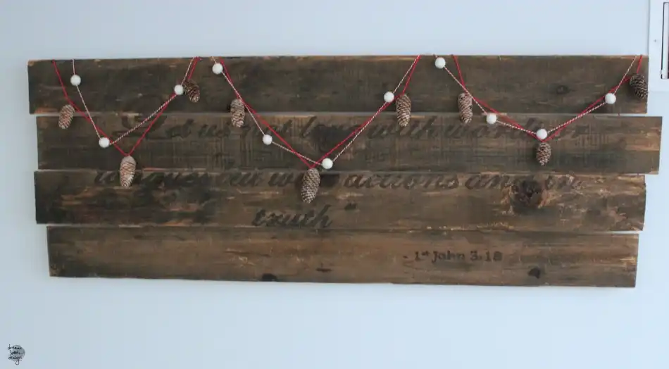 Wood plank decorated with gerlands for Christmas