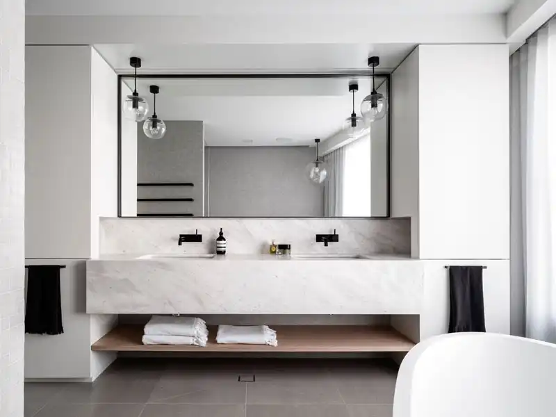 Wood shelf under marble countertop