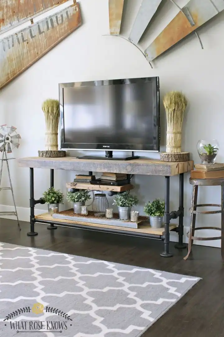 Wood slabs and pis to create a modern industrial stand
