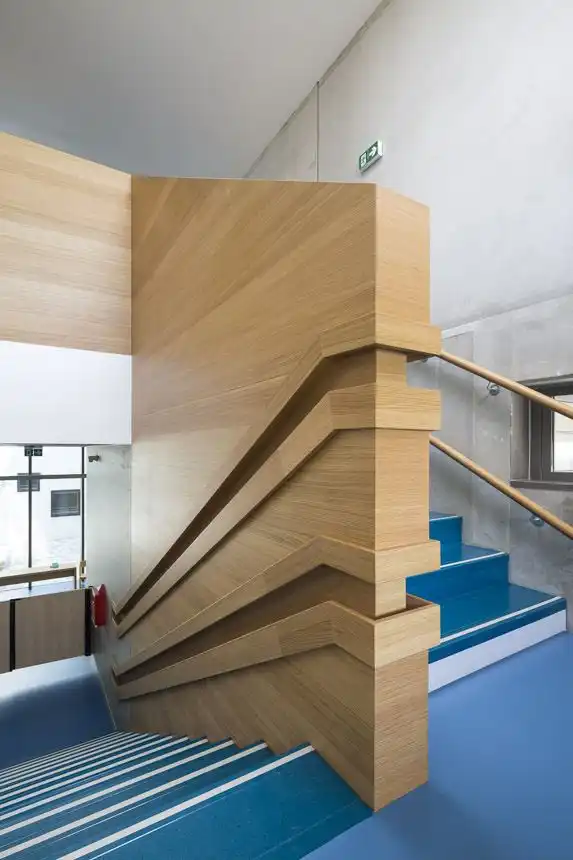 Wood staircase wall and handrail