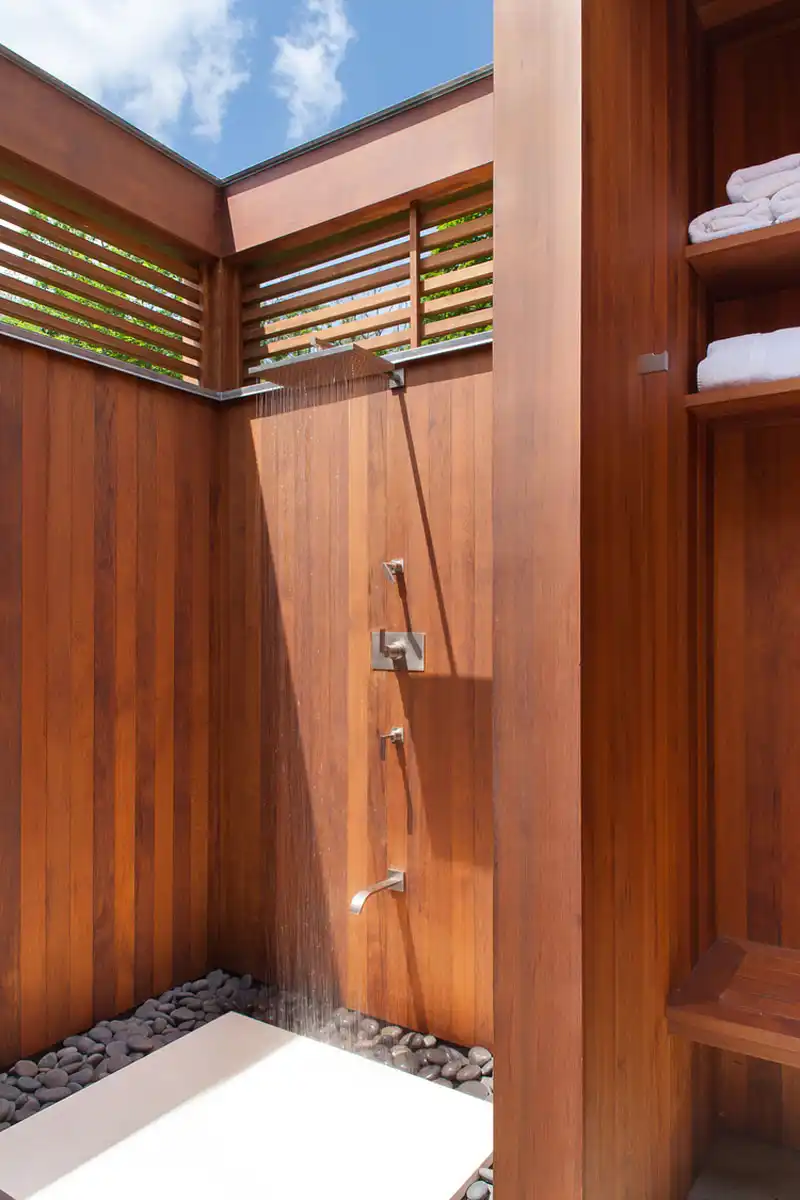Wood surrounded outdoor shower design