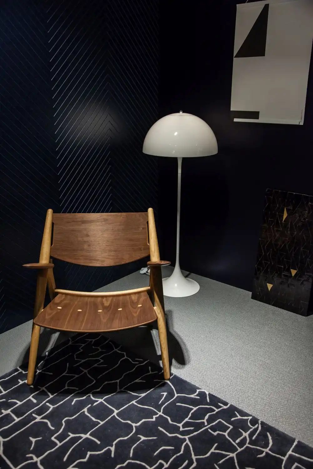The height of the lamp and the angle of the light determine how warm and cozy a reading nook really is