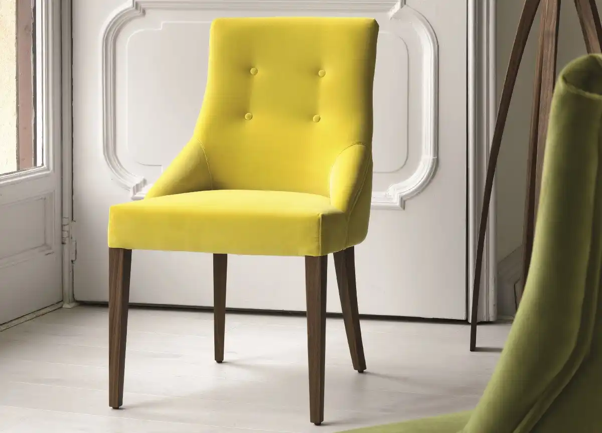 Yellow upholstered with tufted design dining chair