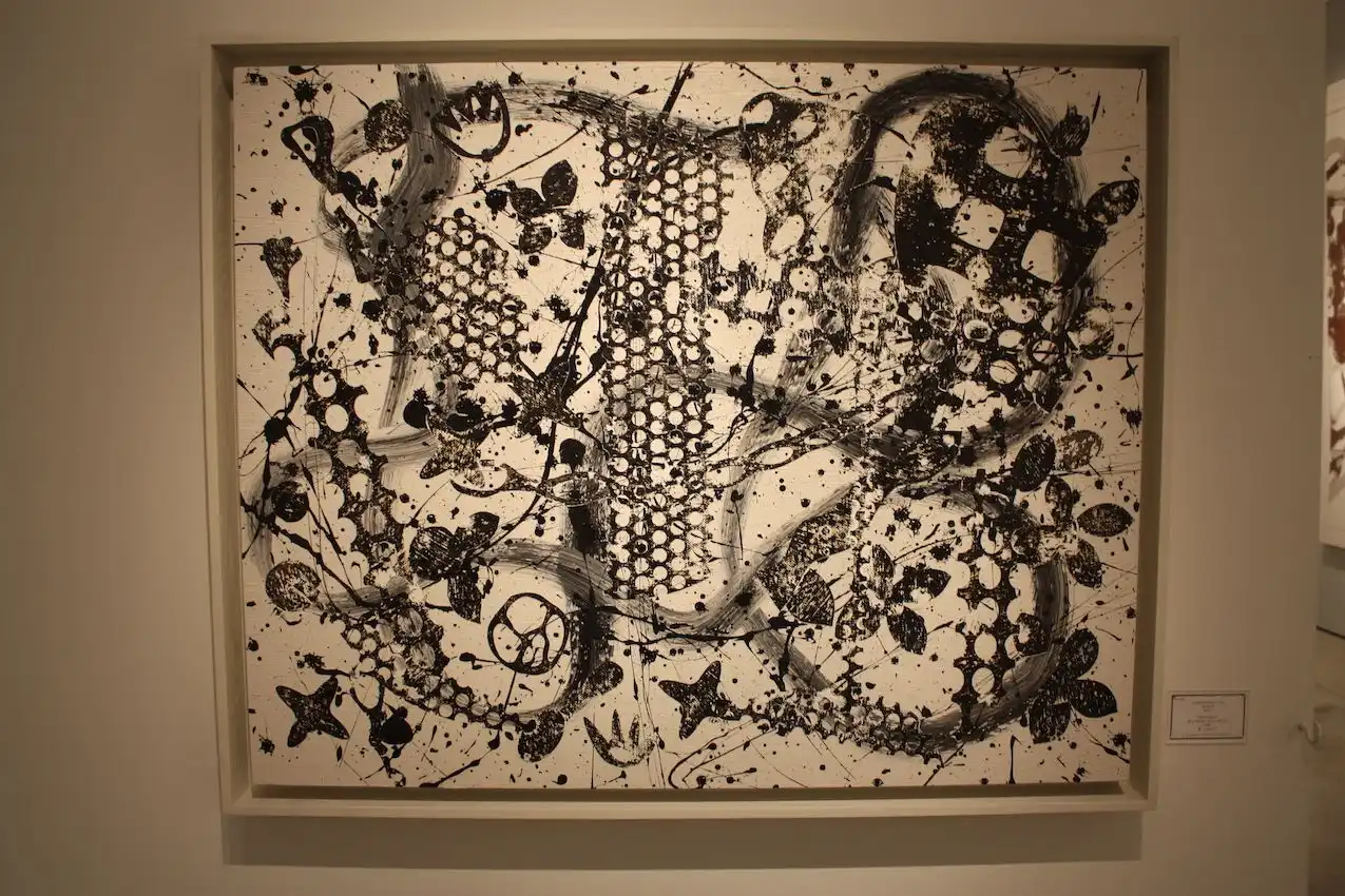 The layers of paint, shapes and techniques make for a dramatic work.