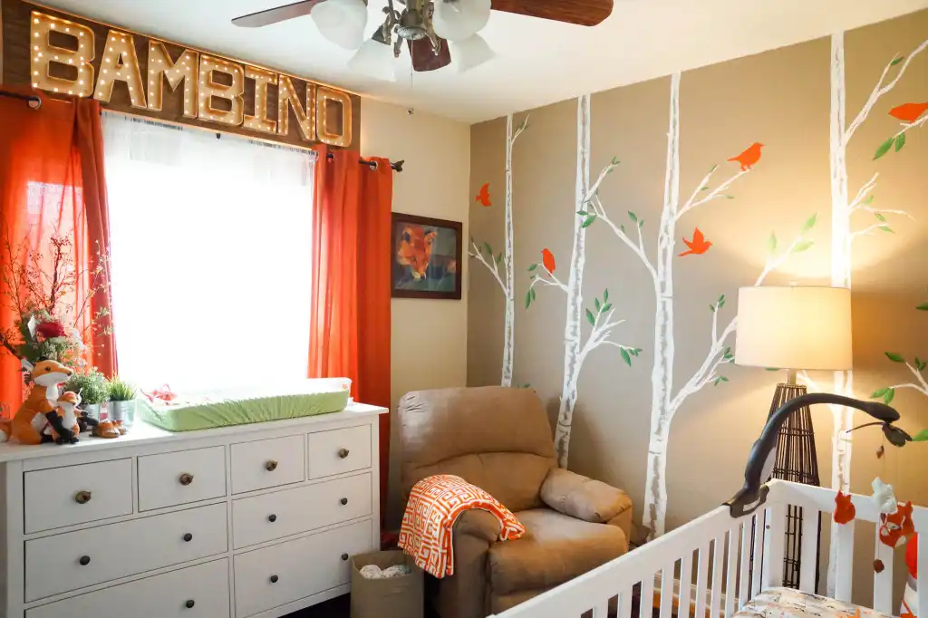 Bambino orange accents nursery room