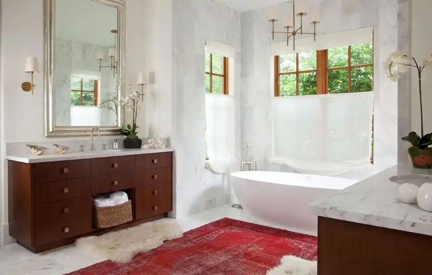 bathroom-featuring-an-overdyed-rug