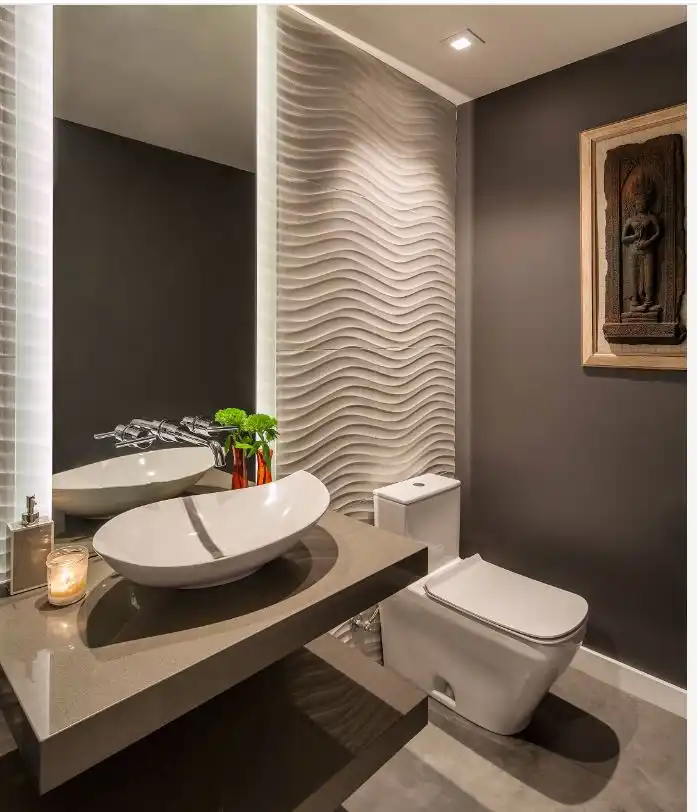 Bathroom with hindu wall sculpture 1