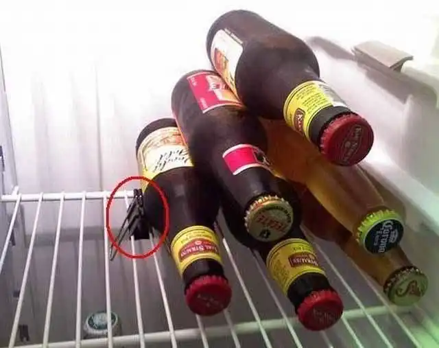 Binder clip to hold up bottles