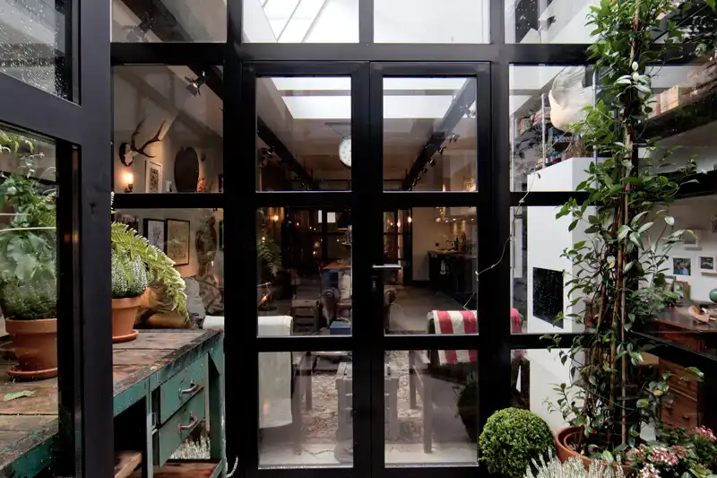 Bricks amsterdarm garage loft black framed windows doors