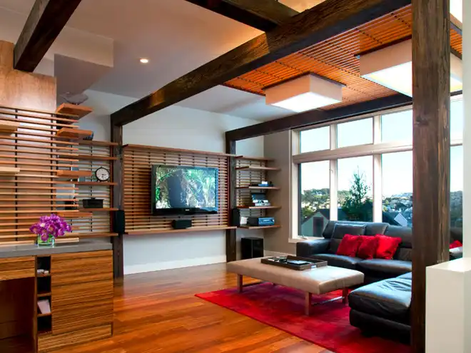 Ceiling and wall shelving idea for family room