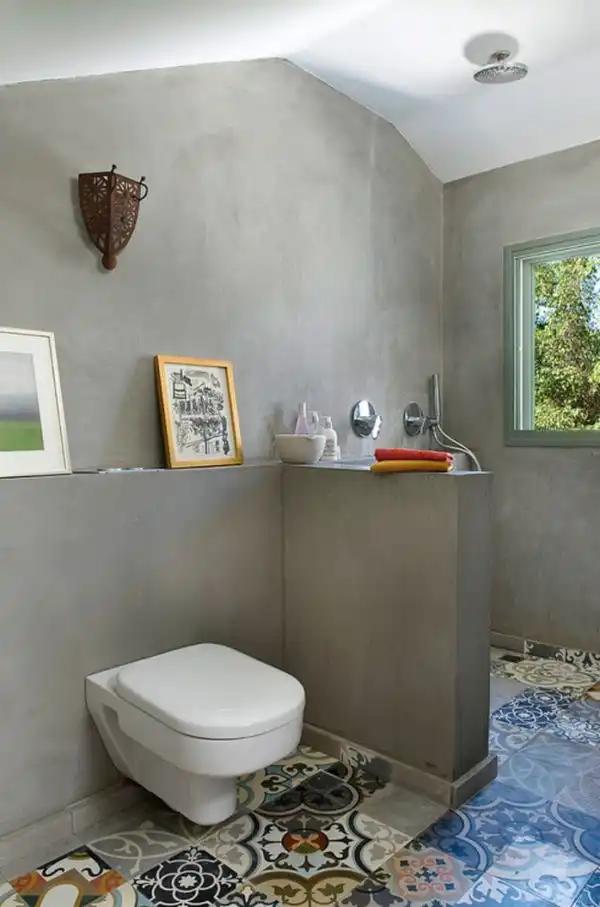 Concrete bathroom patchwork tiles
