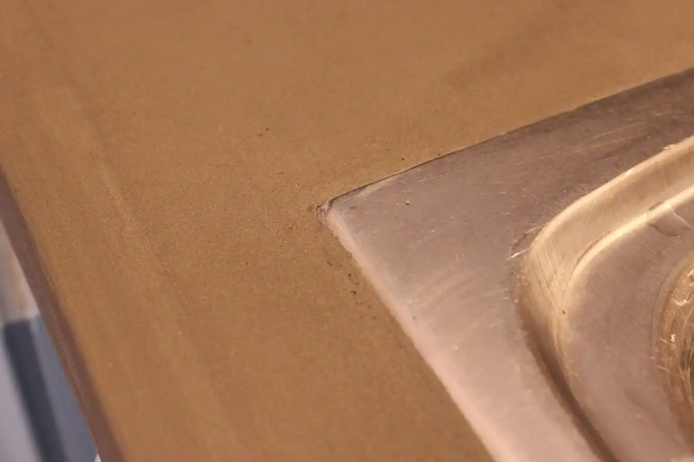 Concrete kitchen counter top work around sink