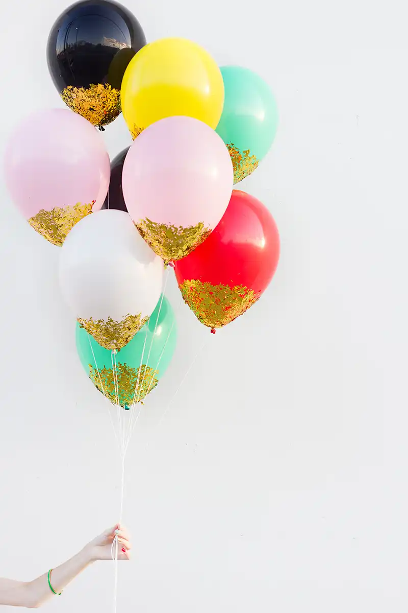 Confetti dipped balloons