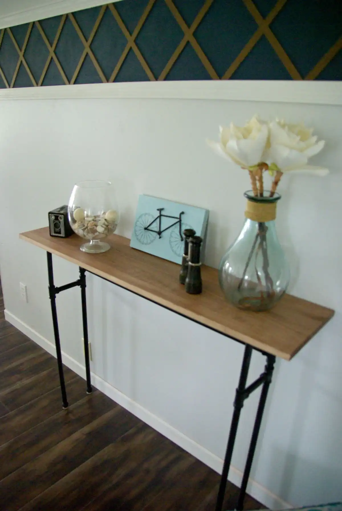 Console table from pipes and wood